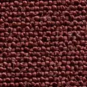 Burgundy textured fabric with a nubby, raised weave and matte finish, displaying tonal variations and a dense, irregular loop pattern.