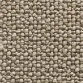Neutral jute textile sample displaying a dense, knotted texture with beige and light brown tonal variations, suitable for upholstery or rugs.