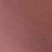 Burgundy textured surface with granular finish, displaying tonal variations and diffused lighting, associated with Formitalia Noby line.
