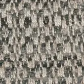 Tweed textile sample, off-white and charcoal gray, with a heathered diagonal weave and visible fiber variations; formitalia spiga.