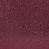 Burgundy textured surface, granular weave, mottled tone, matte finish, close-up detail, abstract background, no visible pattern or branding.