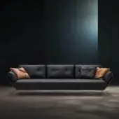 Exclusive WAYNE Enterprises WE-001 sofa with dark fabric upholstery, gold-toned metal feet and accompanying black and brown pillows