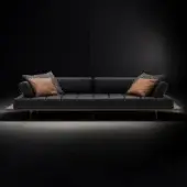 Elegant WAYNE Enterprises WE-029 sofa with sleek black leather upholstery and speckled cushions built with a wood veneer base