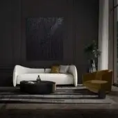 Distinguished WAYNE Enterprises WE-033 sofa with a curved silhouette and light-colored textured textile upholstery crafted in Italy