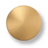 Brushed gold sphere against white backdrop, featuring linear striations and a textured surface with uneven light reflection and a soft shadow.
