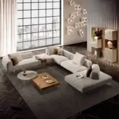 Elegant Lago Air Soft sectional with light gray woven textile upholstery and near-invisible tempered glass legs