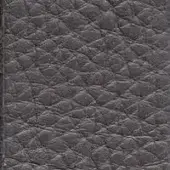 Dark gray pebbled texture with embossed leather effect, dense irregular pattern, matte finish, studio sample displaying 3M Terra material.