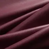 Burgundy leather expanse, pebbled texture, overlapping folds create dynamic shadows, rich wine-red hue, studio lighting, label reads "af 34".