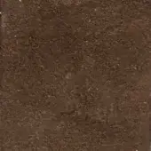 Dark brown textured material, possibly bark or wood fiber, with uneven surface and matte finish; “nk castagna” imprinted.