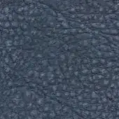 Deep midnight blue textured surface with irregular bumps and ridges, matte finish, studio lighting, neutral background, organic material appearance.