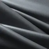Dark gray leather texture with overlapping folds, exhibiting a pebbled grain and diagonal shadows, studio lit with “af 71” tag.