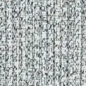 Woven fabric sample, white and gray tweed, dense irregular nubby texture with speckled pattern and visible “turri” label.