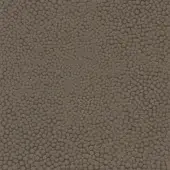 Gray-brown leather texture sample with irregular nodules, matte finish, and subtle embossing; brand text “turri > leather cat. lm > 1229p d” visible.