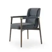 Distinguished Turri Atelier chair with walnut wood structure, brass details and textured blue-gray fabric upholstery