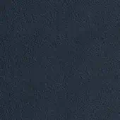 Mottled texture in blue-gray tones with dispersed dark speckles, presenting a dense, irregular pattern across a flat, diffused surface.