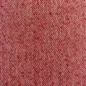 Moroso House of Lords fabric, ruby red herringbone weave with off-white and gold flecks, dense wool-blend texture, matte finish.