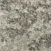 Moroso Nembro fabric, color 20 Sand, displays a dense, irregular weave of beige, gray, and black textural elements on an off-white warp background.