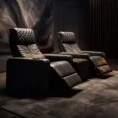 Distinguished WAYNE Enterprises WE-153 home cinema seating upholstered in dark brown leather with quilted detailing and a reclining footrest