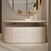 Superior Turri Roma dresser with a curved silhouette and sleek metal details in glossy lacquered light beige