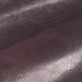 Saddle leather texture in melanzana purple displays a pronounced grain, fine wrinkles, and a subtly glossy finish with tonal variations.