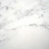Carrara marble texture with white background and grey veining, displaying irregular swirling patterns and a polished sheen, horizontally bisected.