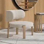 Superior Turri Roma lounge chair with a curved silhouette upholstered in light beige textured textile and refined metal legs