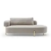Beige rounded sofa with bolster pillow, low profile, curved arms, textured upholstery, brushed gold cylindrical legs, white background.