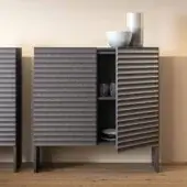 Distinguished Moroso Rows cupboard crafted with oak veneer and MDF, exhibiting a cool dark gray horizontally ridged finish