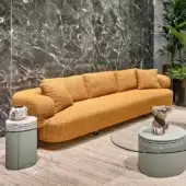 Superior Turri Roma sofa with textured mustard yellow textile and champagne gold finish metal feet