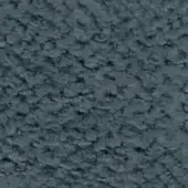 Dense gray texture composed of irregular particles, exhibiting subtle tonal variations and a matte, non-reflective surface with a random pattern.