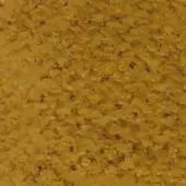 Golden-yellow fabric texture with dense, granular surface and scattered brown speckles, exhibiting a matte, uneven finish.