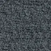 Dark gray granular texture composed of irregular particles, displaying a matte, non-reflective finish with subtle tonal variations and imprinted text.