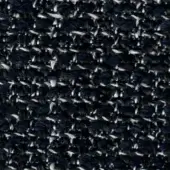Navy blue tweed fabric texture with white and gray speckles, displaying a dense, diagonal twill weave and visible thread variations.