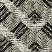 Woven chevron texture in beige, black, and white tones with a dense, jagged zigzag pattern and a slightly raised, knit surface.