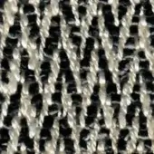 Houndstooth fabric texture with thick, twisted off-white and black yarns, displaying a dense, grid-like weave and slightly nubby surface.