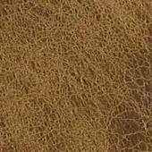 Distressed leather texture in caramel showcases irregular cracks, a matte finish, and subtle tonal variations evoking vintage wear.