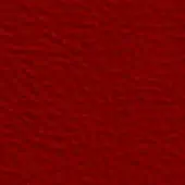Deep red granular texture fills the frame, displaying a consistent stucco-like pattern with subtle tonal variations and diffused studio lighting.