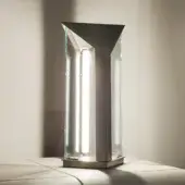 Avant-garde Turri Zero table lamp with clear glass panels and satin metal exhibiting a triangular structure
