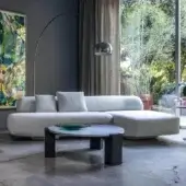 Superior Moroso Gogan sectional upholstered in light neutral textile with a wooden structure and removable cover