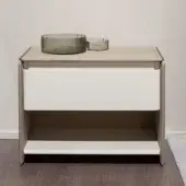 Sophisticated Turri Zero nightstand with beige leather covering, glossy lacquered drawer and microfibre-lined interior for functional storage
