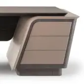 Walnut desk with taupe leather drawer fronts, rectangular tabletop, beveled edge, and block-style legs in a studio setting.