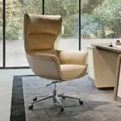 Superior Turri Blues armchair with ergonomic Italian leather upholstery and smooth finish in light beige