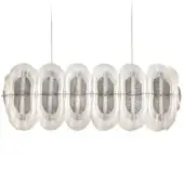 Silver chandelier with six cylindrical lampshades, featuring a pleated design and translucent frosted outer shell, suspended in a studio setting.