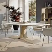 Captivating Turri Soul table boasts a serpentine leg in light beige matte with a smooth light gray and white marble top