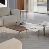 Superior Turri Soul coffee table with light metal legs and matte wood plus white marble-like top crafted with an asymmetrical design