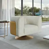 Elegant Turri Soul lounge chair with light beige woven textile and caramel leather panels, built with a bronze metal swivel base