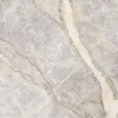 Fior di Pesco marble texture with cool gray base, creamy white veins, polished finish, and natural fissures creating a dynamic, muted pattern.