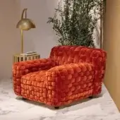 Distinguished Turri Azul lounge chair with vibrant orange velvet upholstery and meticulous macro weave finish