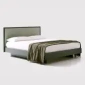Awase bed, dark gray finish, low platform with textured gray fabric headboard and white bedding, wood legs visible in studio setting.