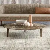 Exceptional Turri Riban coffee table with rounded silhouette, marble top and matte brown leather detailing